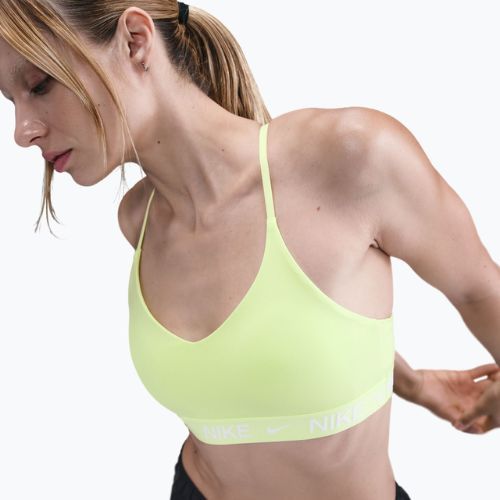 Biustonosz treningowy Nike Dri-Fit Indy Light Support light lemon twist/white pearl