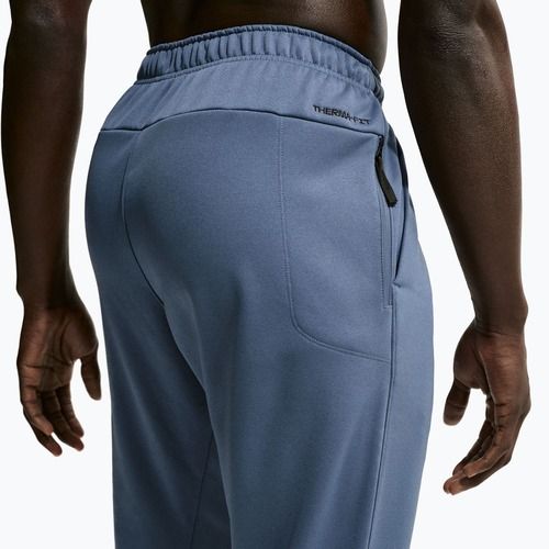 Spodnie treningowe męskie Nike Therma-FIT Open Hem diffused blue/diffused blue/black