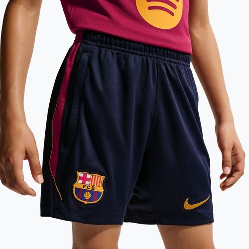 Spodenki piłkarskie dziecięce Nike FC Barcelona Strike blackened blue/noble red/mineral yellow