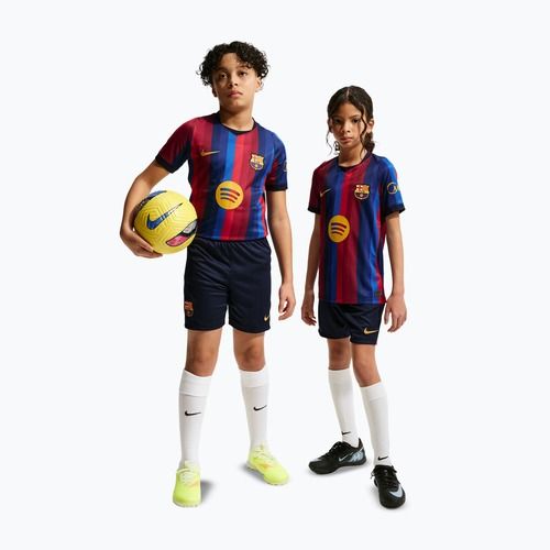 Spodenki piłkarskie dziecięce Nike FC Barcelona Dri-Fit Stadium Home blackened blue/mineral yellow