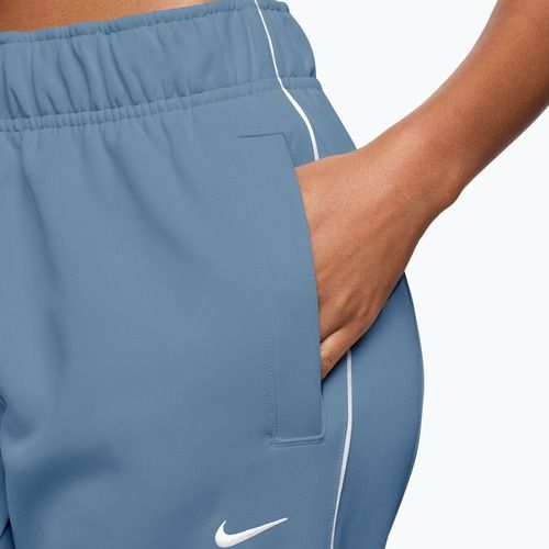 Spodnie damskie Nike Sportswear Windrunner work blue/white/white
