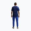 Spodnie piłkarskie męskie Nike FFF Tech Fleece Joggers game royal/metallic copper 3