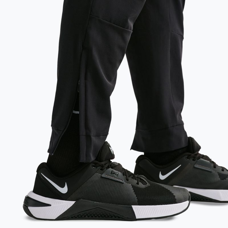 Spodnie męskie Nike Unlimited Dri-Fit Zippered Cuff black/black/black 6
