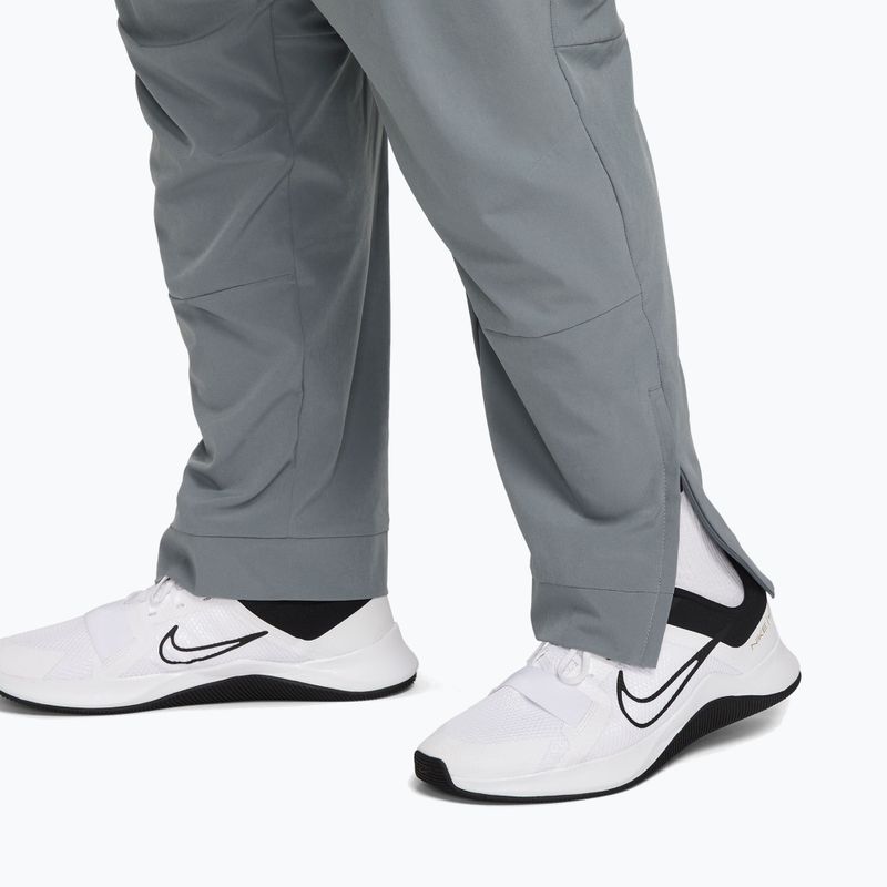 Spodnie męskie Nike Unlimited Dri-Fit Zippered Cuff smoke grey/black/smoke grey 7