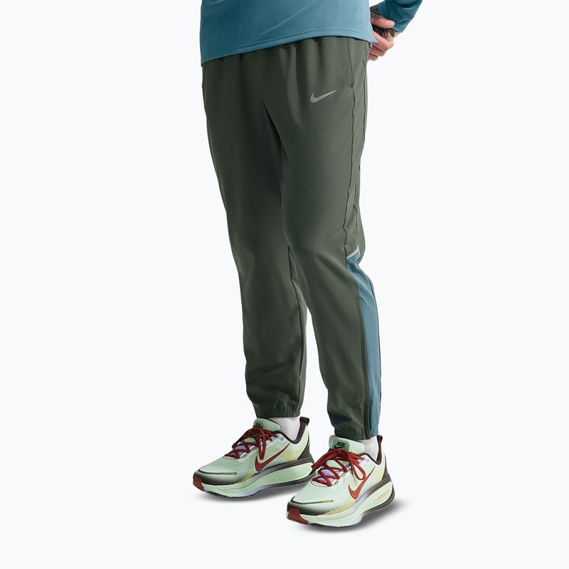 Spodnie do biegania męskie Nike Miler Dri-Fit Woven camo green/mineral slate