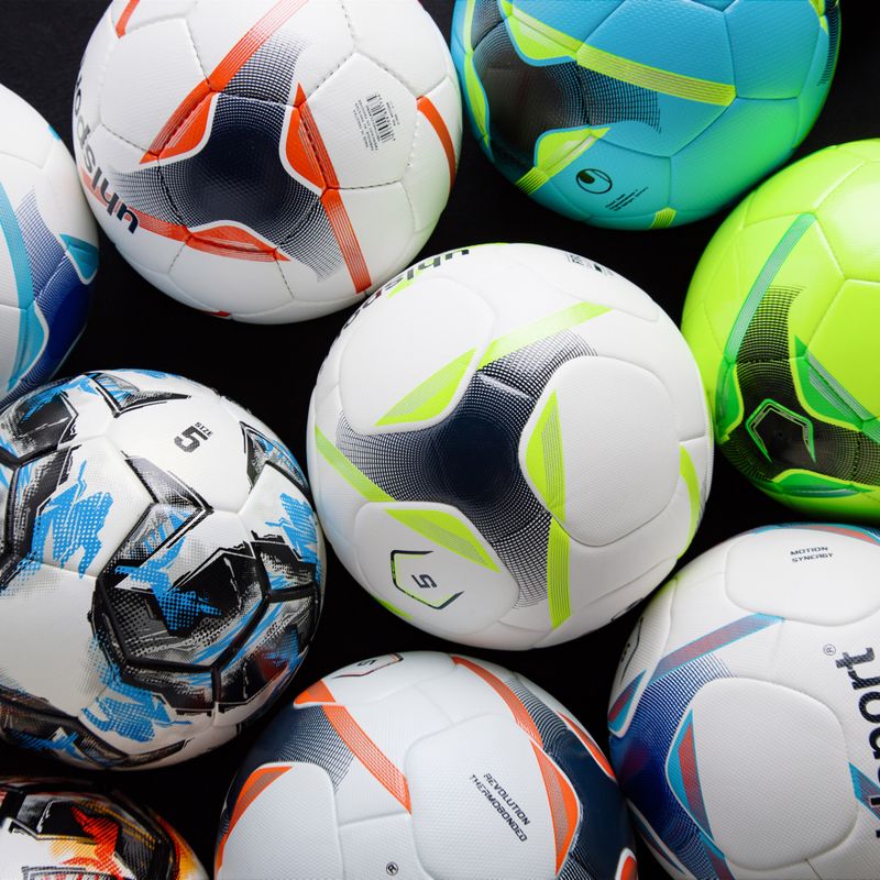Piłka do piłki nożnej uhlsport Resist Synergy biała/czarna/neonowa pomarańczowa rozmiar 5